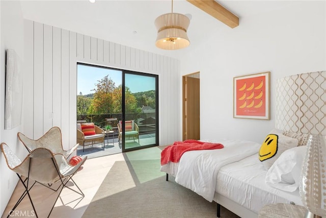 bedroom featuring beam ceiling, access to exterior, and light colored carpet