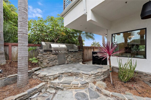 view of patio with area for grilling