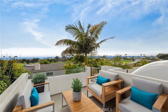 wooden deck with an outdoor hangout area