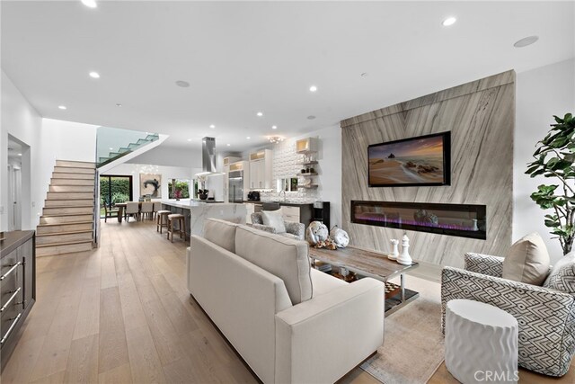 living room with light hardwood / wood-style floors