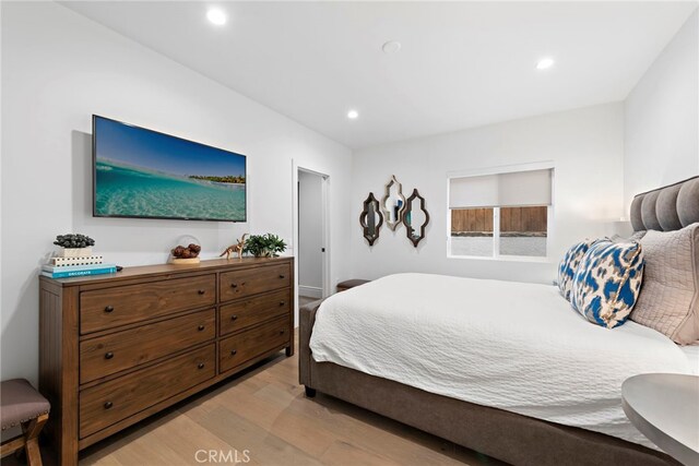 bedroom featuring light hardwood / wood-style flooring