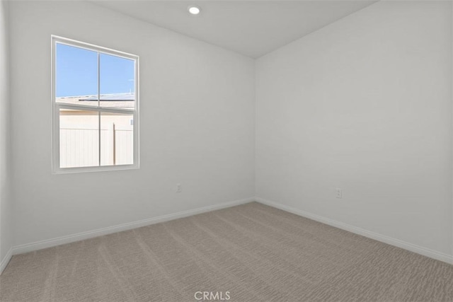 unfurnished room with carpet