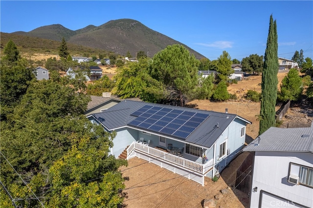 drone / aerial view featuring a mountain view