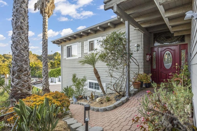 view of side of home featuring a patio