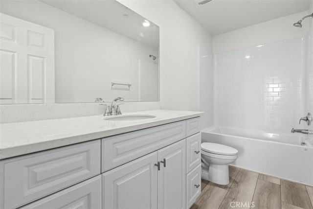 full bathroom with vanity, toilet, and shower / bath combination