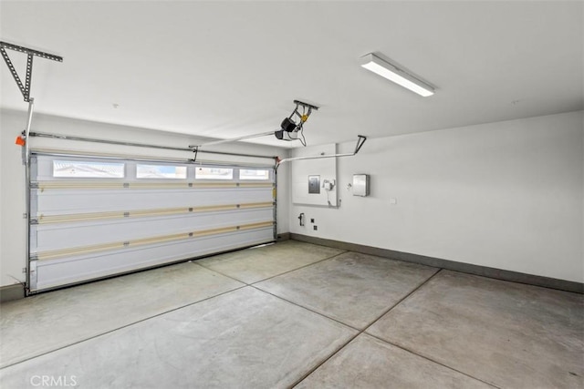 garage featuring a garage door opener