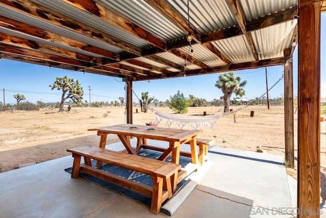 view of patio / terrace with a rural view