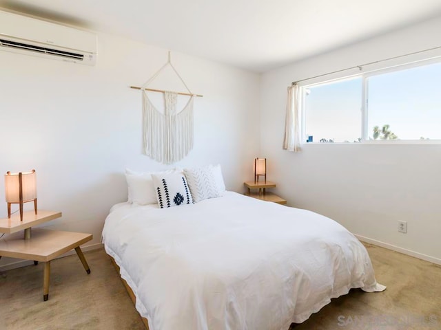 carpeted bedroom featuring an AC wall unit