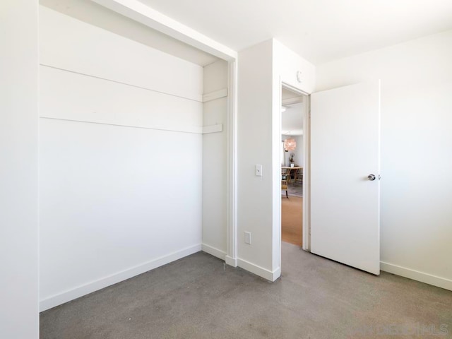 unfurnished bedroom featuring a closet