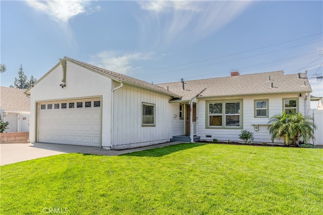 ranch-style home with a garage and a front yard