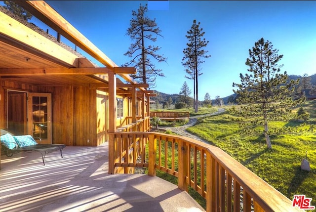 wooden terrace with a mountain view