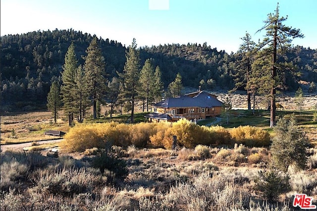 property view of mountains featuring a rural view