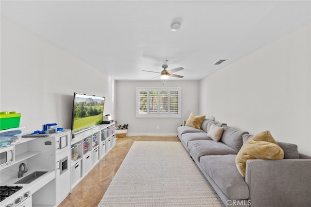 living room with ceiling fan