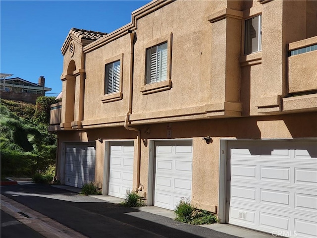 exterior space featuring a garage