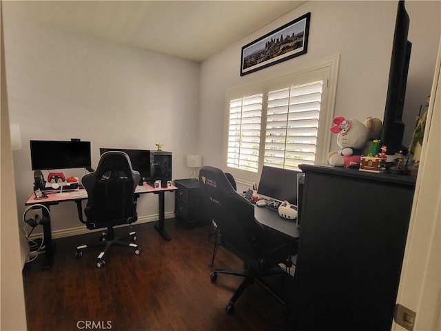 office space with dark wood-type flooring