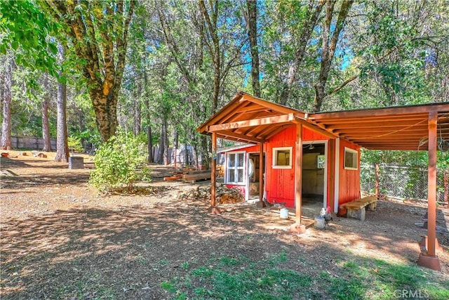 9226 La Porte Rd, Brownsville, CA 95919 - view of poultry coop with a carport and fence