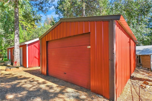 view of outdoor structure featuring a garage