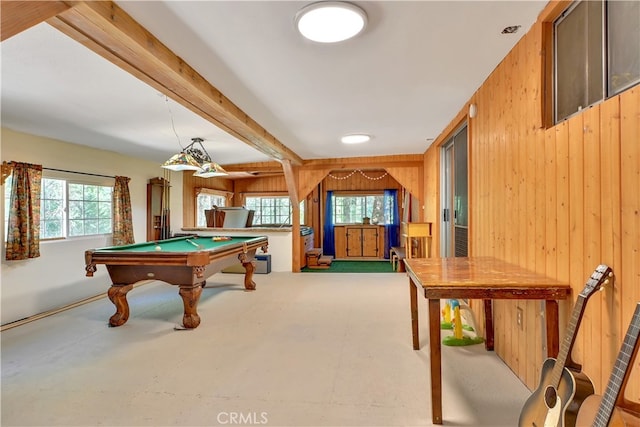 recreation room with beamed ceiling, wooden walls, and pool table