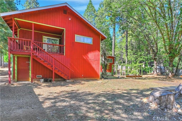9226 La Porte Rd, Brownsville, CA 95919 - exterior space featuring stairway and a vegetable garden
