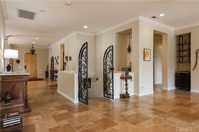 hall featuring ornamental molding