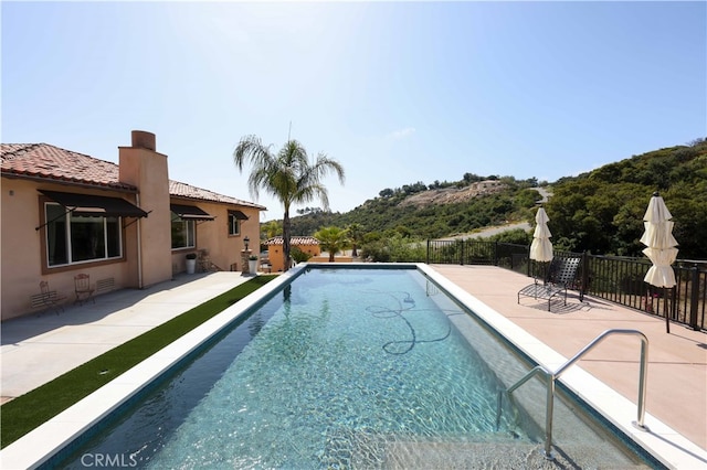 view of pool with a patio area