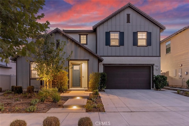 view of front of property featuring a garage