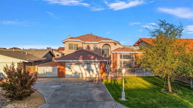 view of front of home with a front yard and a garage