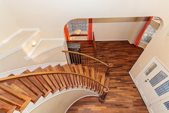 stairway featuring hardwood / wood-style floors