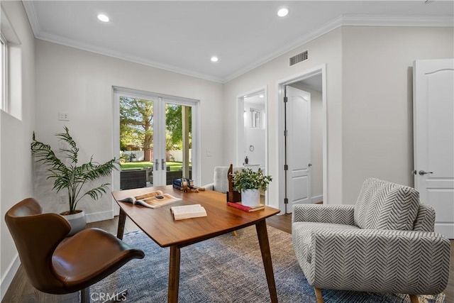 office space featuring wood-type flooring, ornamental molding, and french doors