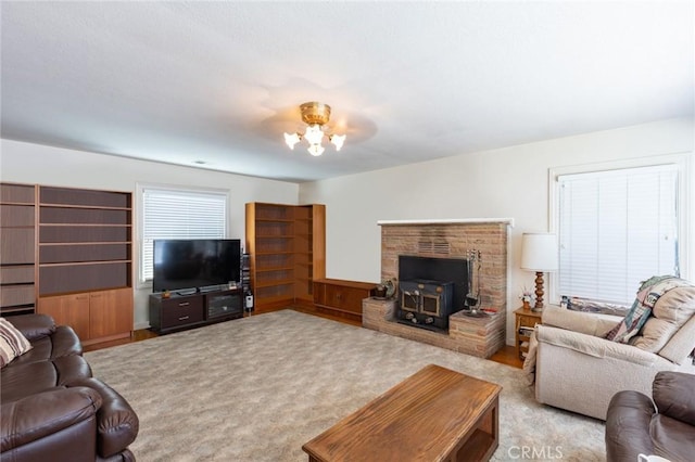 living area featuring a wood stove