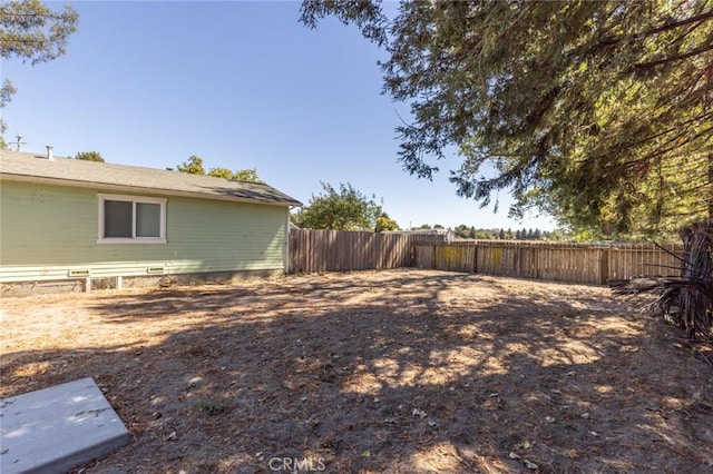 view of yard featuring a fenced backyard