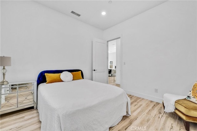 bedroom featuring hardwood / wood-style floors