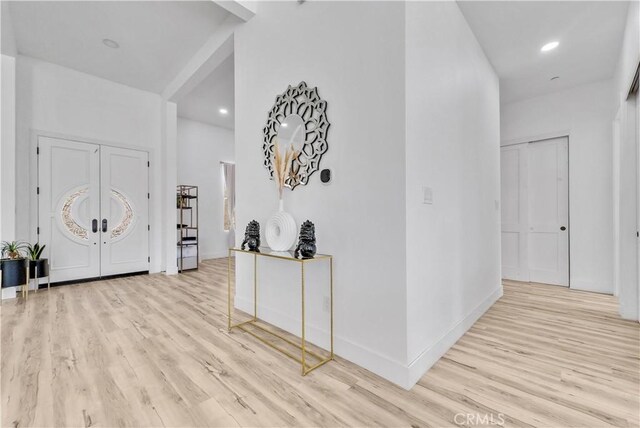 entrance foyer featuring light hardwood / wood-style flooring