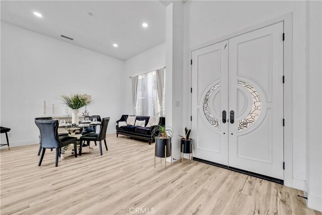 foyer entrance featuring light hardwood / wood-style floors