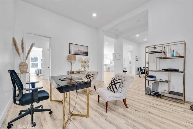 office space with light wood-type flooring