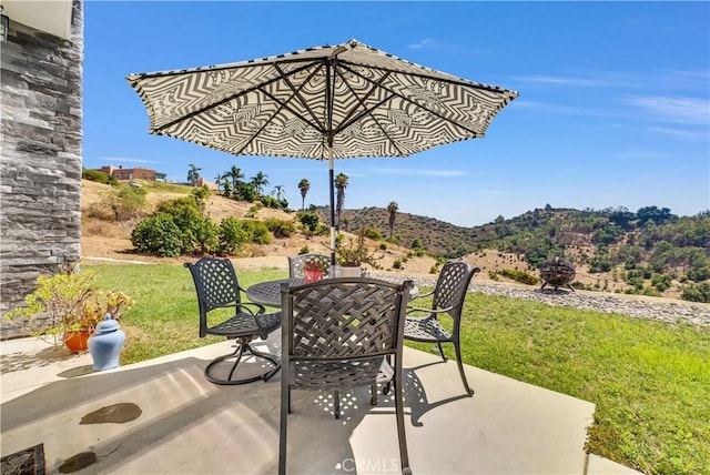 view of patio with a mountain view