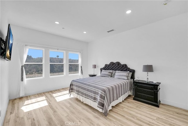 bedroom featuring light hardwood / wood-style floors