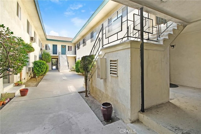 view of side of home featuring a patio