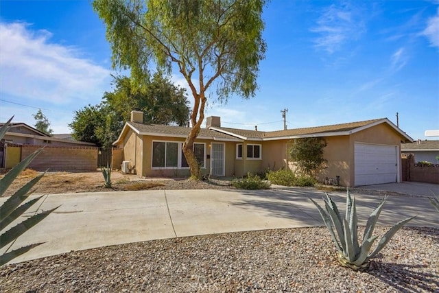 ranch-style home with a garage