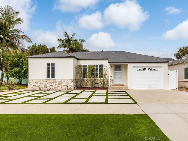 ranch-style house featuring a garage