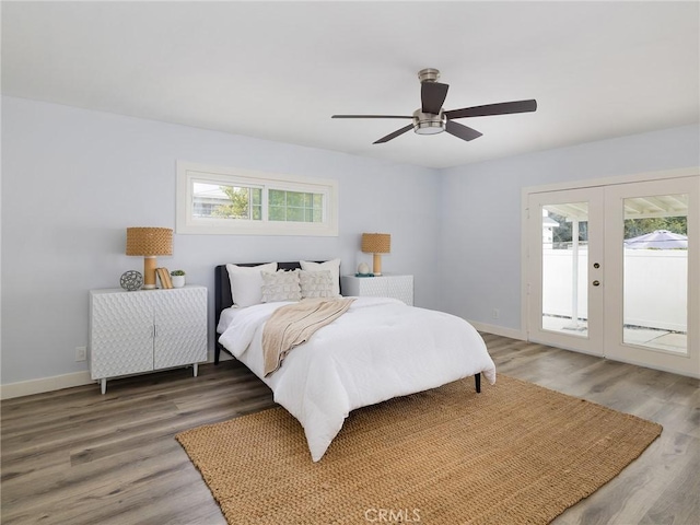 5451 W 117th St, Hawthorne, CA 90304 - bedroom with multiple windows, access to exterior, wood finished floors, and french doors
