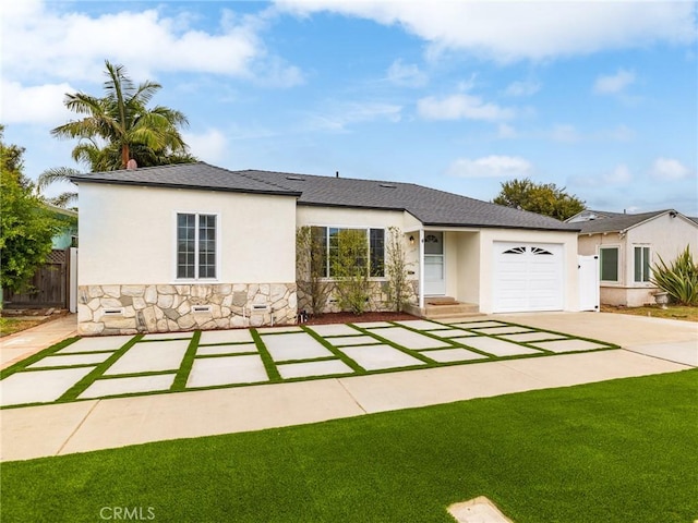 5451 W 117th St, Hawthorne, CA 90304 - ranch-style home featuring stone siding, an attached garage, stucco siding, and driveway