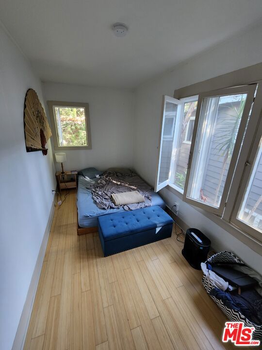 bedroom featuring light hardwood / wood-style flooring