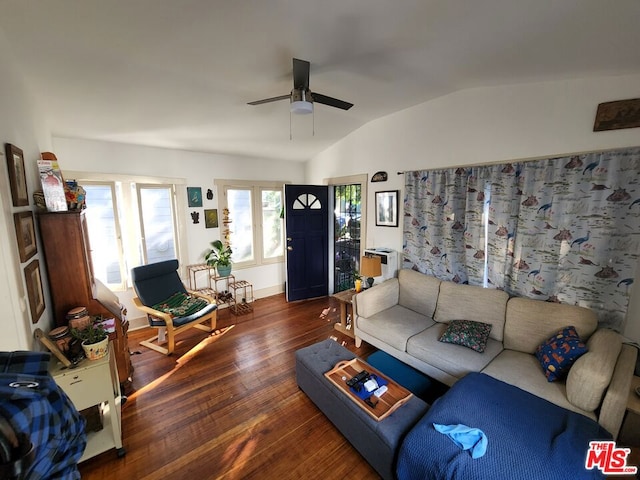 living room featuring vaulted ceiling, ceiling fan, and dark hardwood / wood-style flooring