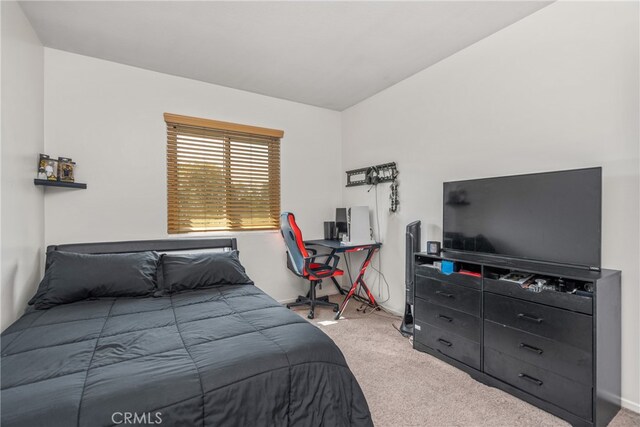 bedroom featuring carpet