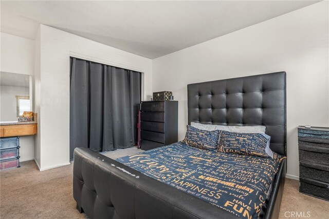 bedroom featuring carpet flooring