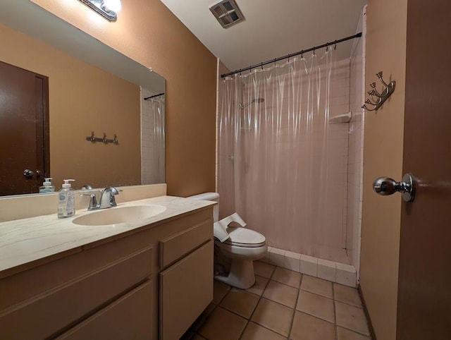 bathroom featuring tile patterned flooring, vanity, toilet, and a shower with curtain