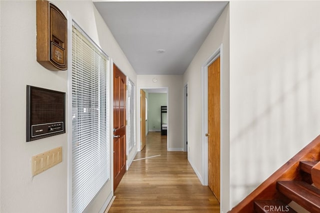 hallway with light wood-type flooring