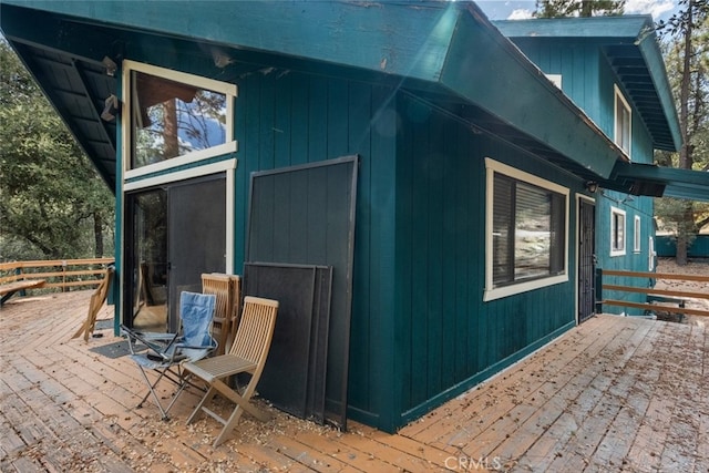 view of home's exterior featuring a deck