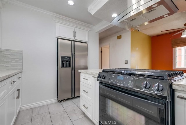 kitchen featuring stainless steel fridge, light stone counters, crown molding, white cabinets, and black gas range